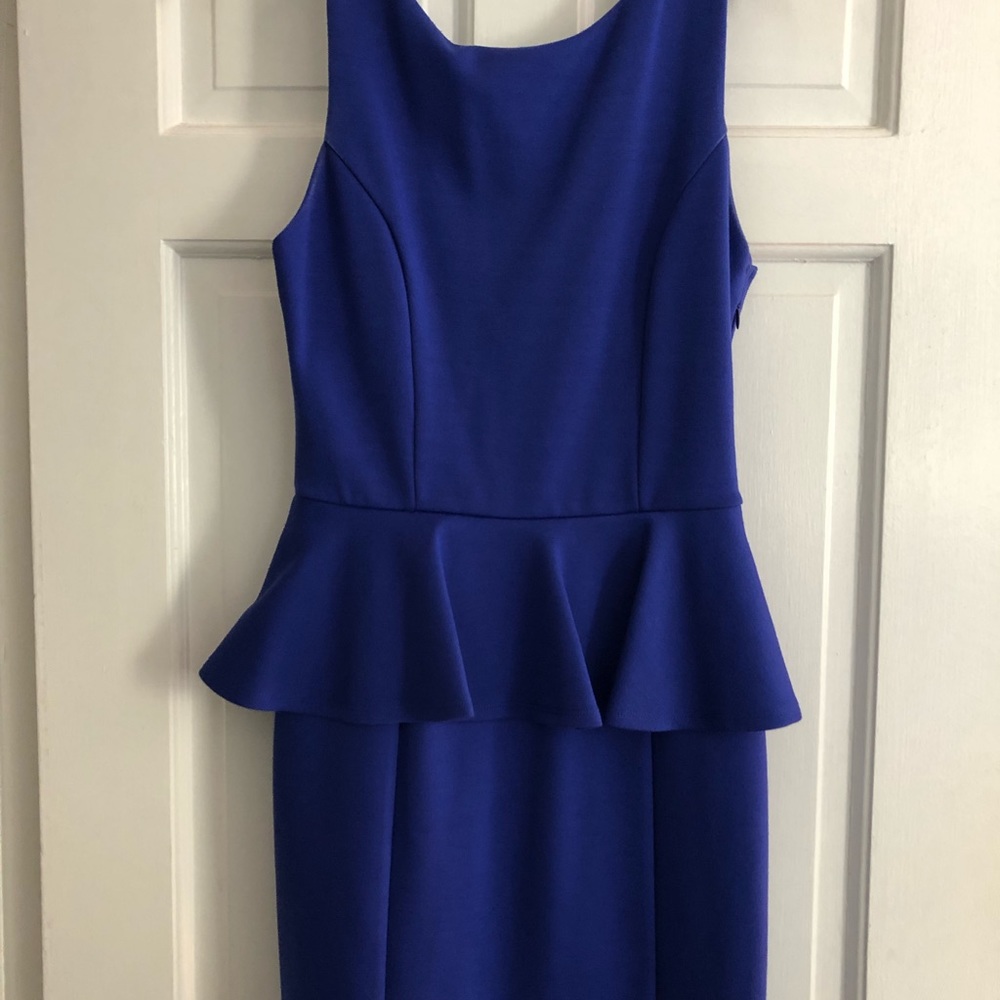 Short peplum dress with side zipper, size small.